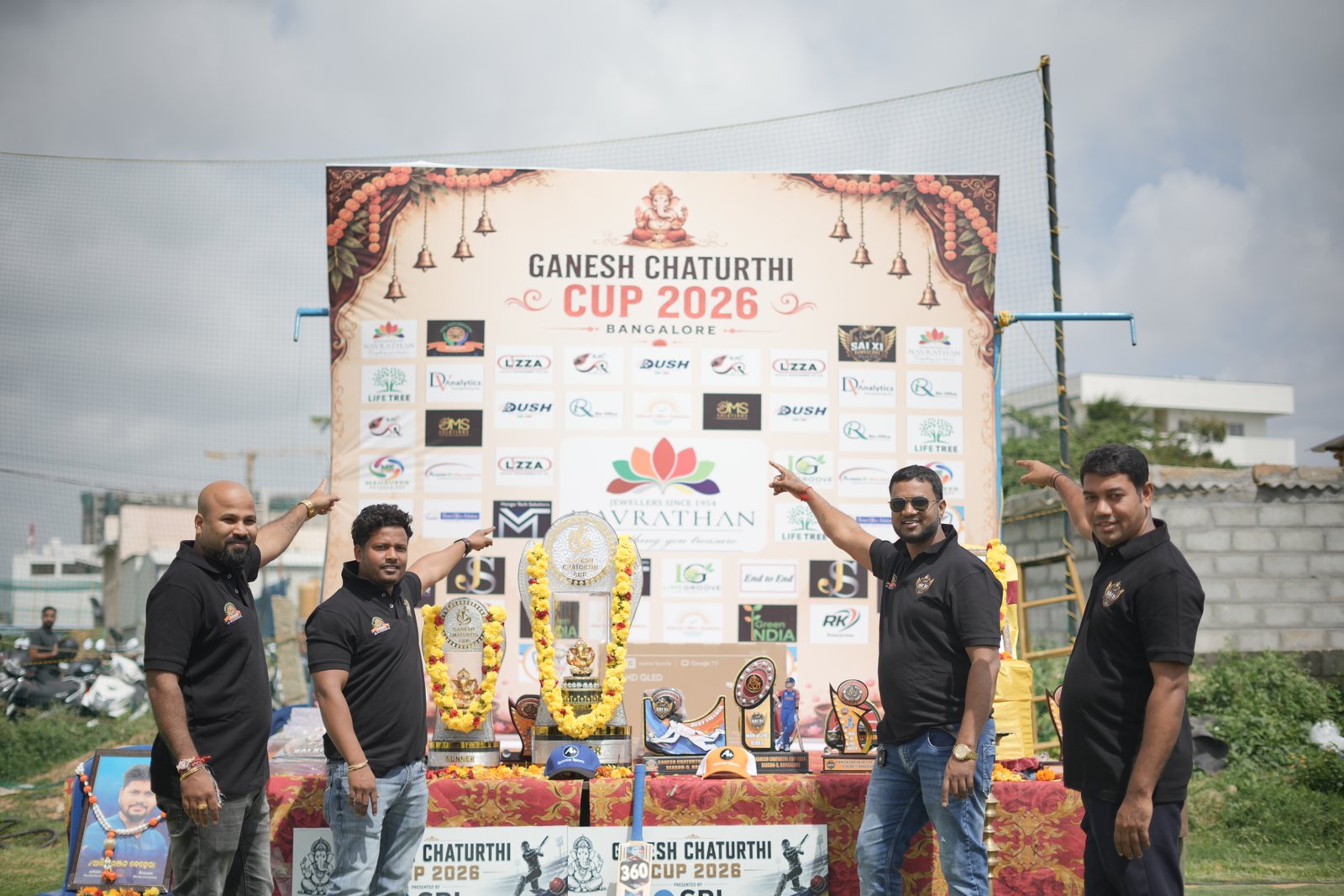 Tournament trophies and community members at the 2026 Cup
