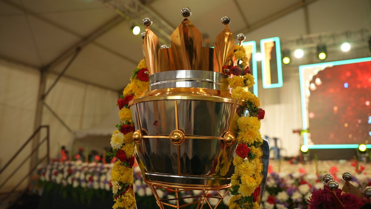 Flower-decorated trophy at the celebration