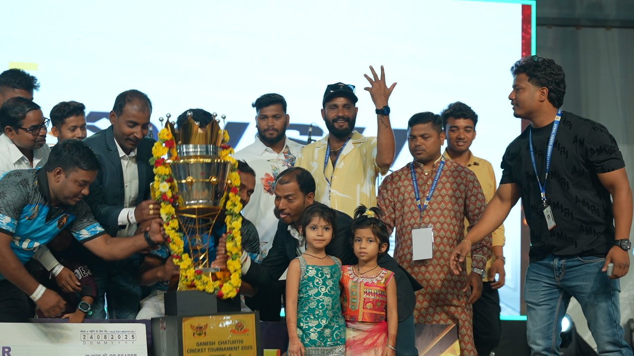 Celebrating with the trophy