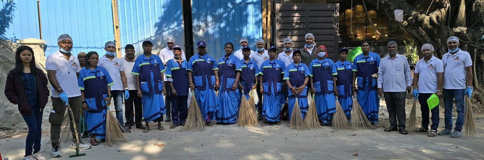 UYA volunteers and sanitation workers together