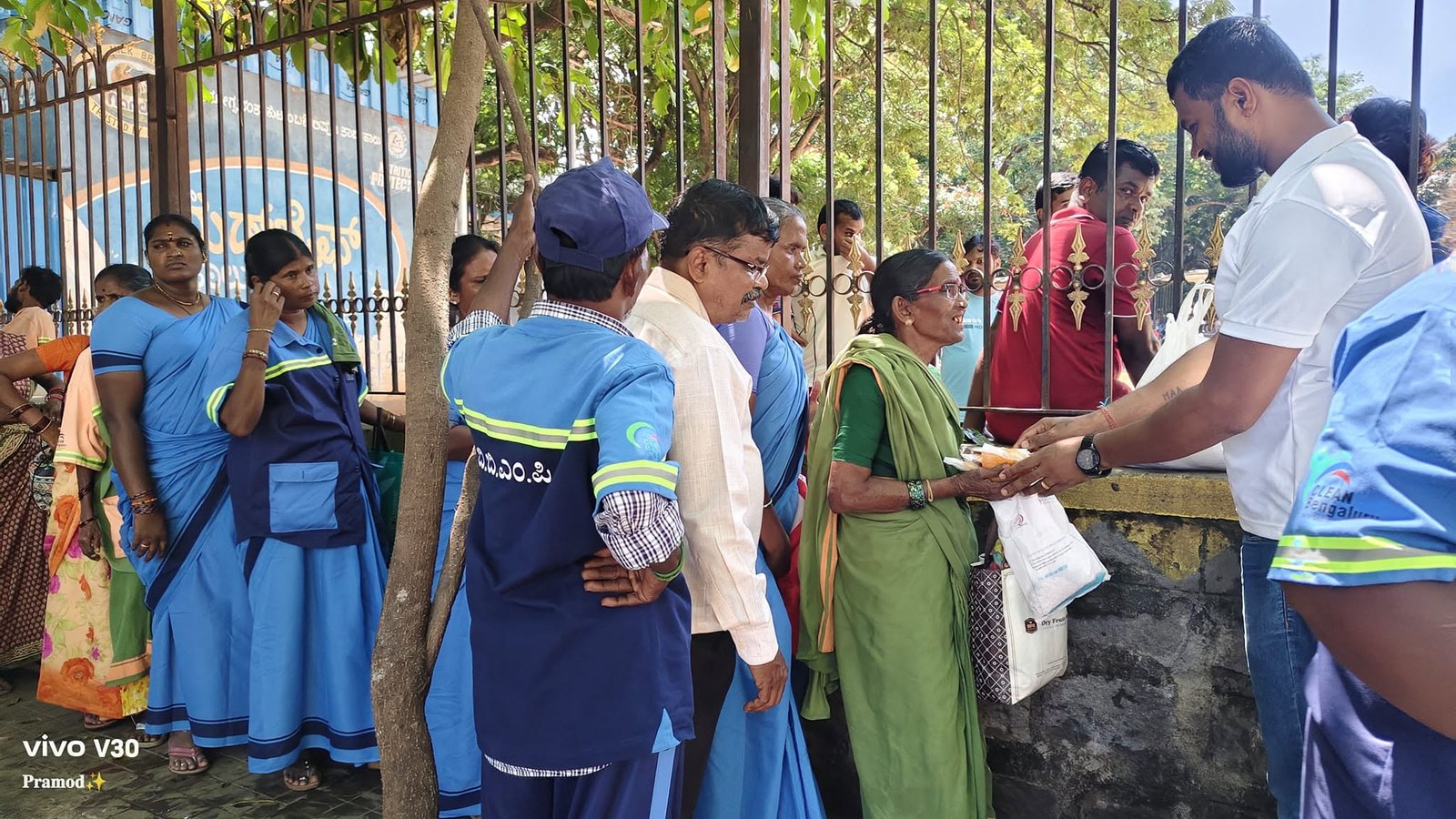 UYA volunteers serving food to community members